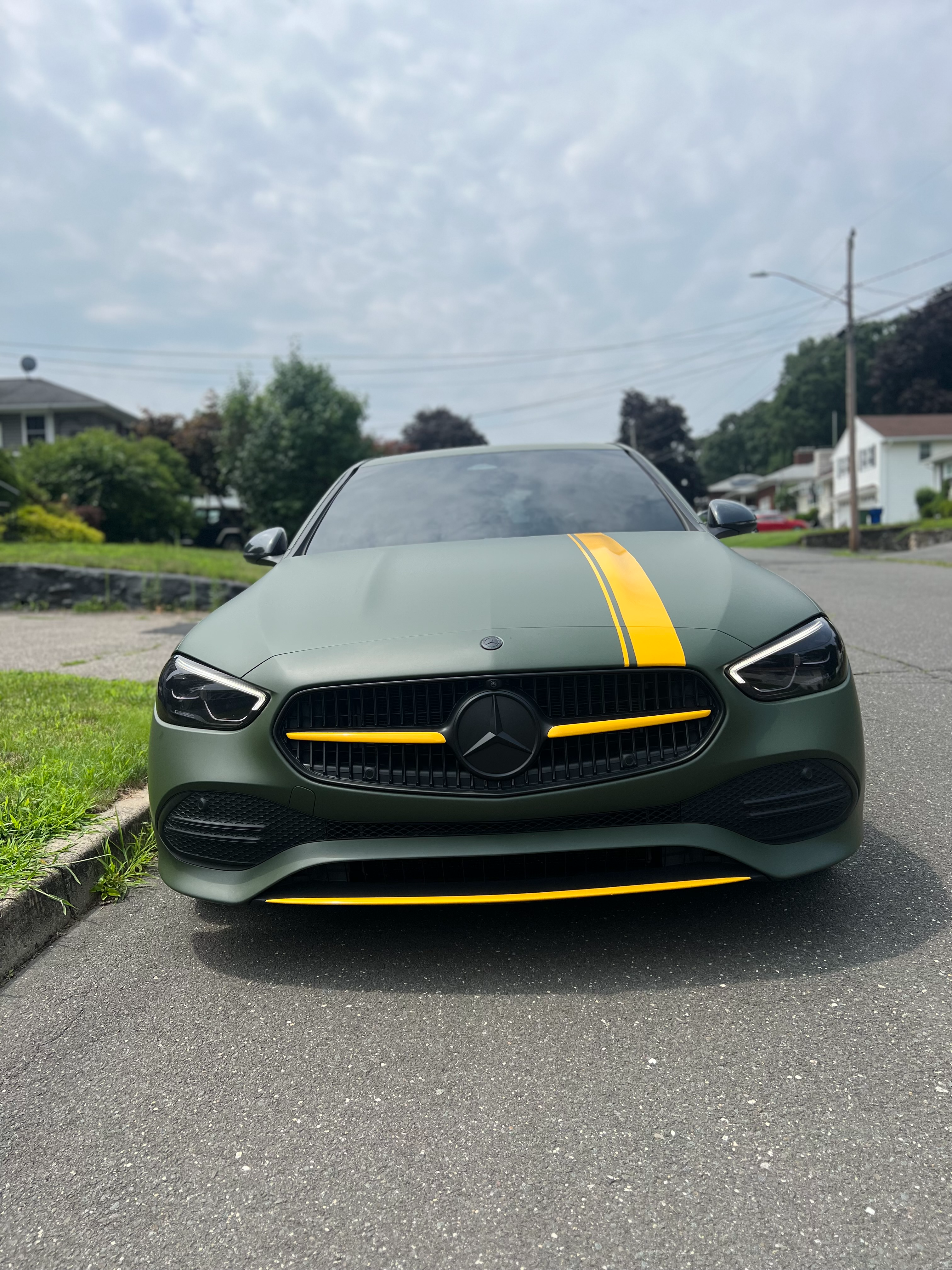 Matte green Mercedes-Benz with yellow detailing